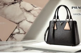 Elegant black luxury handbag on marble background