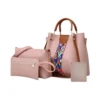 Stylish pink handbag set with colorful strap